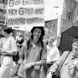 International Women's Day marchers with banners, George Street  Sydney, 1995