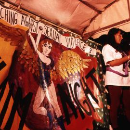 On stage at Reclaim the night rally, 1993