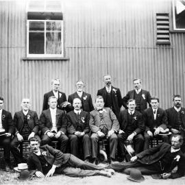 Group portrait outside of building, circa 1910