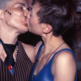 Lesbians kissing at the Sleaze Ball party, Driver Avenue Moore Park, date unknown