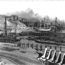 View looking south along the east side of Darling Harbour, 1909