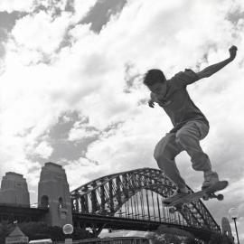 Skater against background of Harbour Bridge, Circular Quay Sydney, 2000