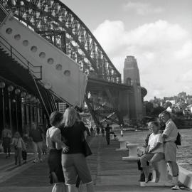 Tourists looking towards Harbour Bridge, Circular Quay Sydney, 2001