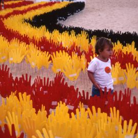 Child at SEA OF HANDS Installation, Coogee Beach, 2002