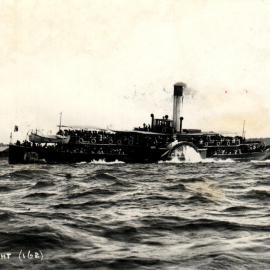 Ferry PS. FAIRLIGHT passes Garden Island heading for Manly.