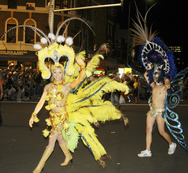 Showgirl in yellow, Sydney Gay & Lesbian Mardi Gras (SGLMG), Taylor Square Darlinghurst, 2005 (A-00065288)