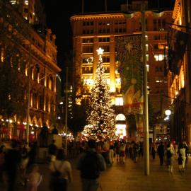 Lit Christmas tree beside cenotaph at Christmas concert and tree lighting, Martin Place Sydney, 2003
