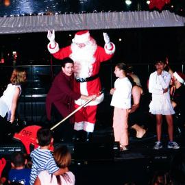 Clover Moore and Santa light Christmas tree, Martin Place Sydney, 2004