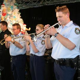 NSW Police Band trumpet section at Christmas concert performance, Alexandria Park Alexandria, 2005