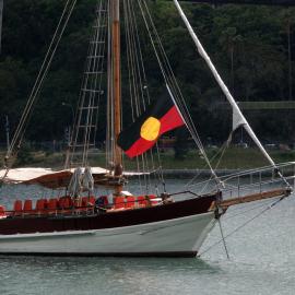 The 'Tribal Warrior' moored in Blackwattle Bay with hoisted Aboriginal flag, 2003