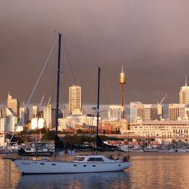 Yacht 'Paramico' moored in the bay against a backdrop of the city at sunset, Blackwattle Bay, 2004