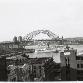View looking north west of Sydney Harbour Bridge from above Circular Quay, circa early 1950s