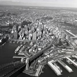 Aerial view of Sydney CBD from above the Harbour Bridge, 1960s