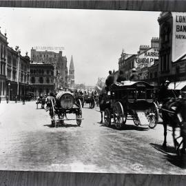 Horse-drawn carriages in George Street Sydney, 1900