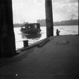 Ferry launch HELVETIA arrives at Erskine Street wharf, circa 1932