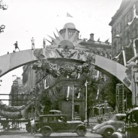 Sun arch decoration for royal visit, Bridge Street Sydney, 1954