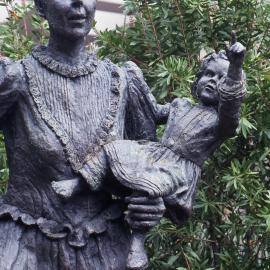 Sculpture of woman holding a child, Sydney 1988