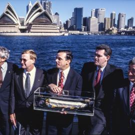 Lord Mayor Frank Sartor receiving the Olympic flag on Sydney Harbour, 1996