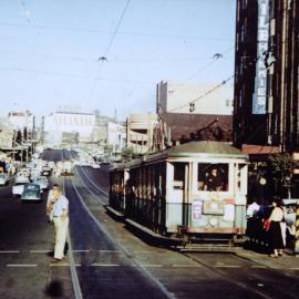 Lilyfield tram taking passengers at Mountain Street crossing, Broadway Ultimo, 1957