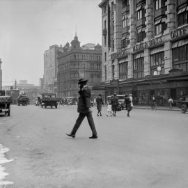 Pedestrians crossing Park Street Sydney, 1929