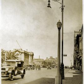 Old and new experimental light standards on Macquarie street Sydney, 1926