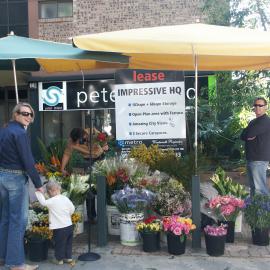 Florist, woman with child, address unknown Potts Point, 2004