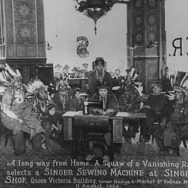 Crowds watching Indian 'squaw' in Singer Sewing Machines shop window