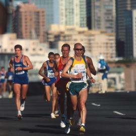 Marathon runners crossing the ANZAC Bridge at Pyrmont, Sydney, 2000