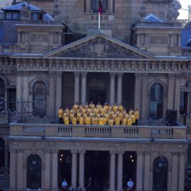 Choir greets the arrival of the Olympic torch at the Sydney Town Hall, George Street Sydney, 2000
