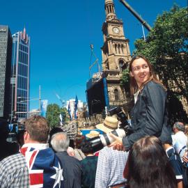 Spectators waiting on George Street before the Olympic Athletes parade, Sydney, 2000