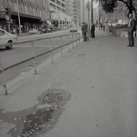 Streetscape and footpath damage, Elizabeth Street Sydney, 1973