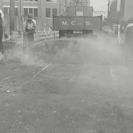 Laying asphalt on Bay Street Ultimo, 1936